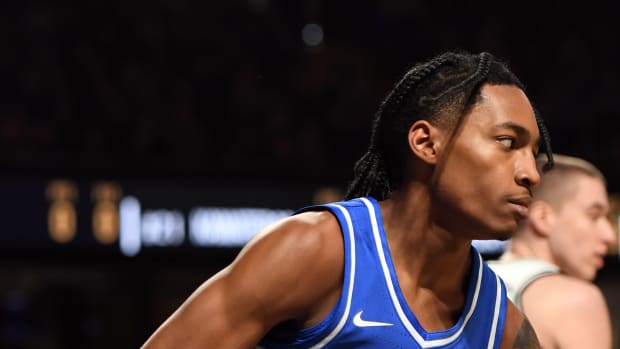 Feb 6, 2024; Nashville, Tennessee, USA; Kentucky Wildcats guard Rob Dillingham (0) celebrates after a basket during the first half against the Vanderbilt Commodores at Memorial Gymnasium. Mandatory Credit: Christopher Hanewinckel-USA TODAY Sports